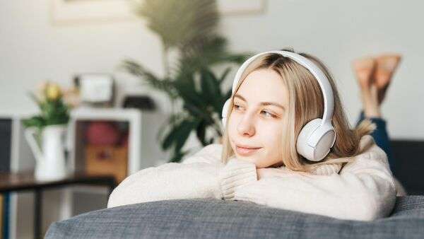 Simple headphones and listening equipment in a calm indoor setting